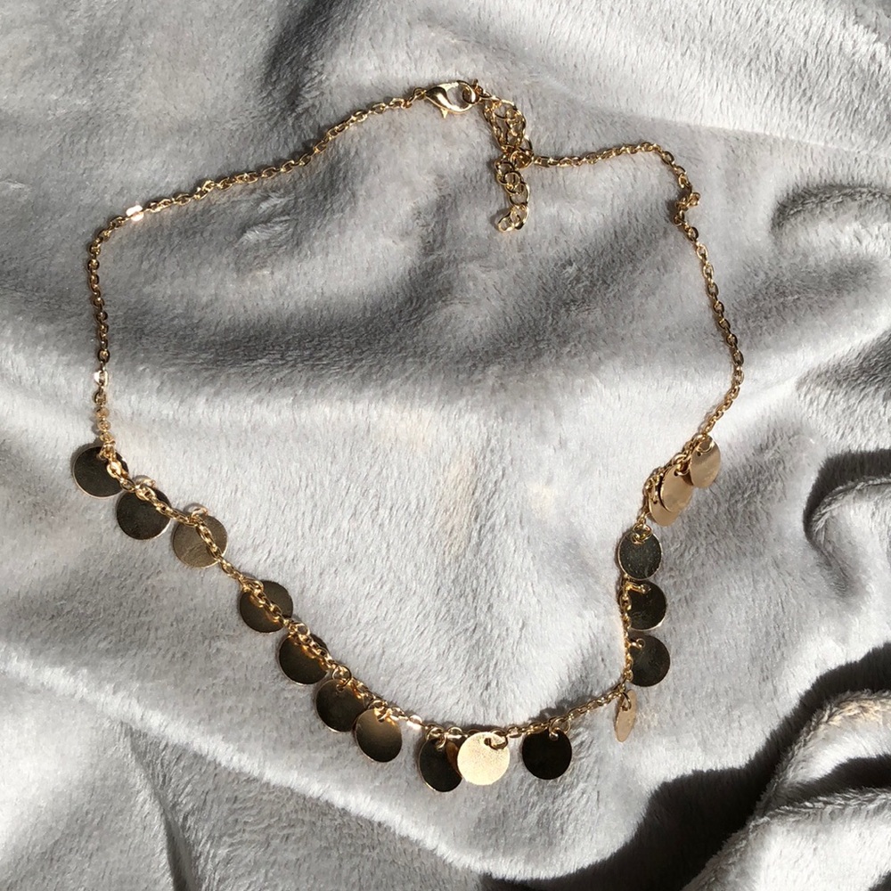 Gold disc charmed choker